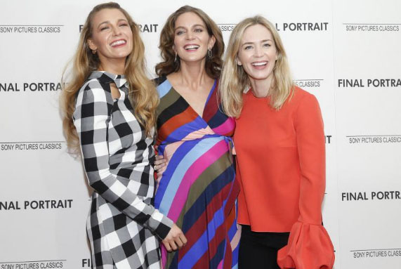 Emily Blunt poses for a picture with her siblings.